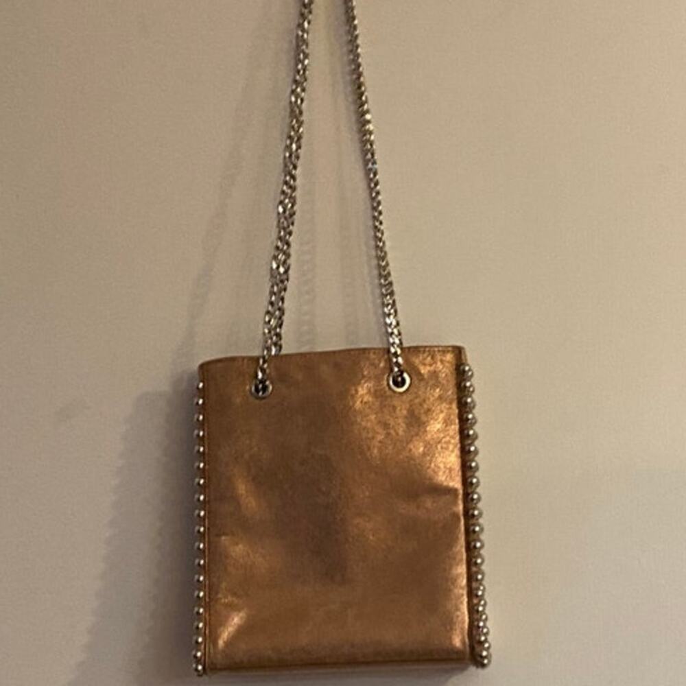 Mettalic Pink Purse with Silver Trim and Strap.